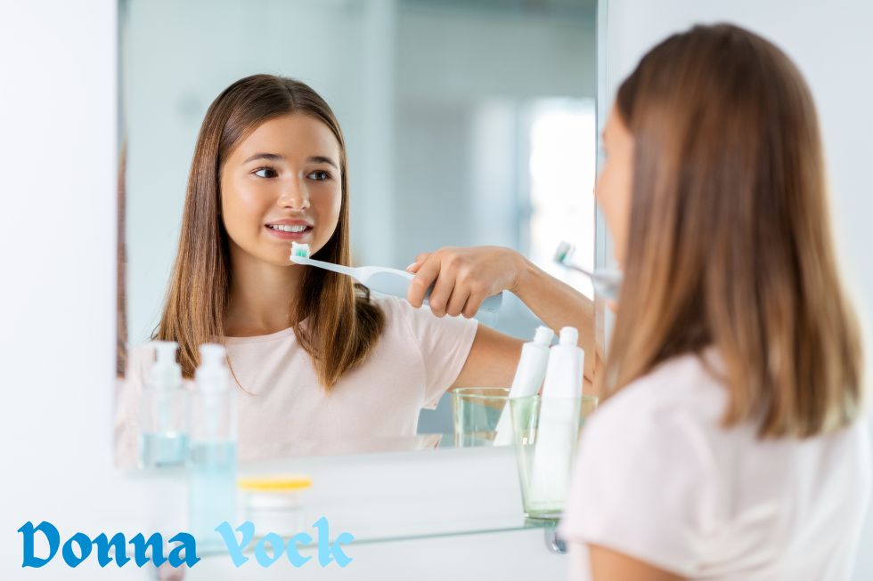 Which is preferable, brushing by hand or by electricity?